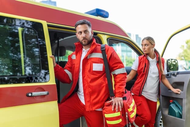 Paramedics stepping out of an ambulance with an emergency kit